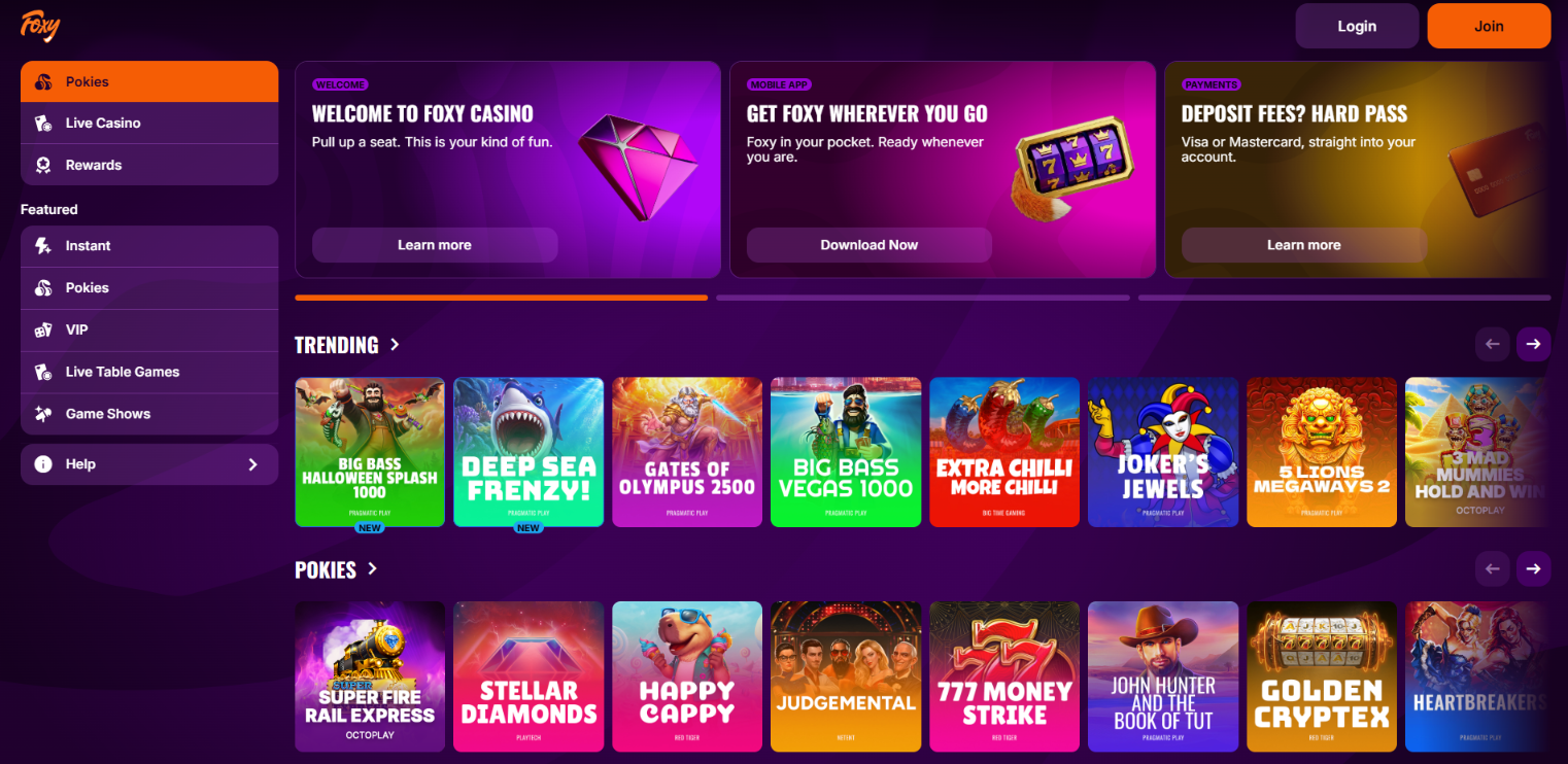 FoxySpins Casino homepage featuring pokies, mobile access and Visa and Mastercard deposit information.